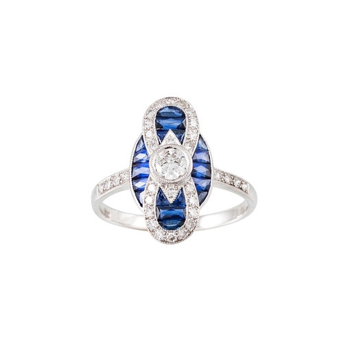 245 - A SAPPHIRE AND DIAMOND PLAQUE CLUSTER RING, in the Art Deco style, the centre diamond to a diamond a... 