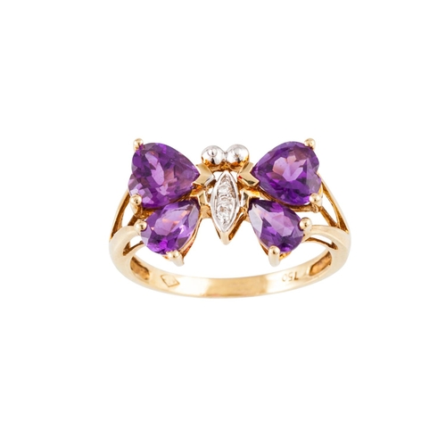 249 - AN AMETHYST AND DIAMOND NOVELTY RING, modelled as a butterfly, the amethyst wings to a diamond set b... 