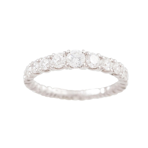 102 - A DIAMOND ETERNITY RING, the graduated brilliant cut diamonds mounted in 18ct white gold. Estimated:... 