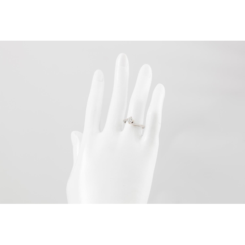 117 - A DIAMOND SOLITAIRE RING, the brilliant cut diamond mounted in an 18ct white gold twist mount. Estim... 