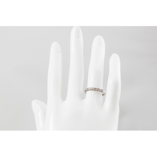 118 - A DIAMOND HALF ETERNITY RING, the brilliant cut diamonds mounted in 18ct white gold.  Estimated; wei... 