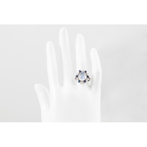 150 - A MOONSTONE, SAPPHIRE AND DIAMOND RING, of cluster form, mounted in 18ct gold, size M - N