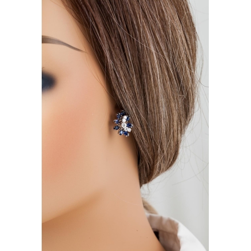 157 - A PAIR OF DIAMOND AND SAPPHIRE SPRAY CLUSTER EARRINGS, set with brilliant cut diamonds and marquise ... 