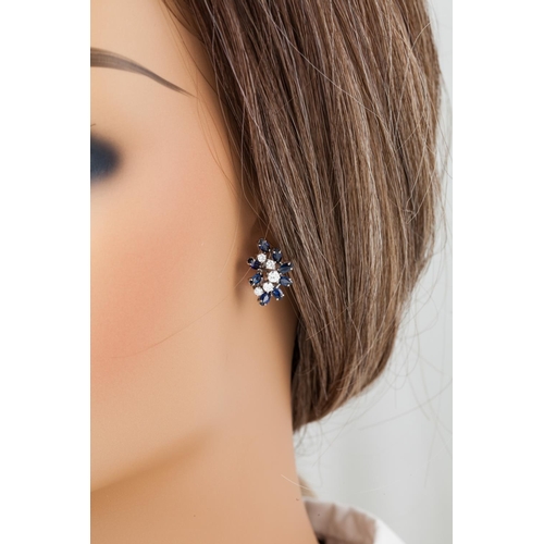 157 - A PAIR OF DIAMOND AND SAPPHIRE SPRAY CLUSTER EARRINGS, set with brilliant cut diamonds and marquise ... 