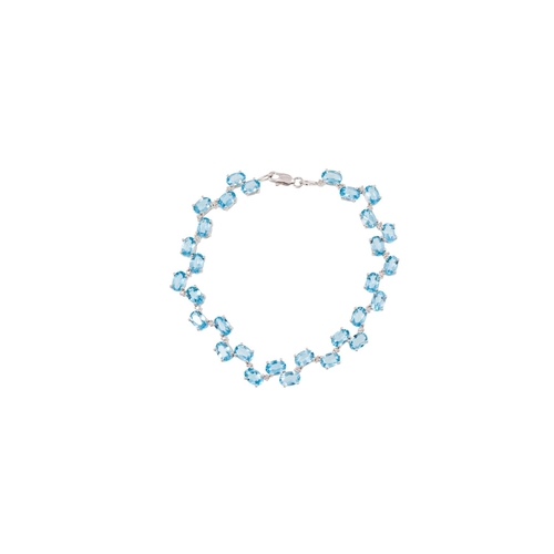 2 - A BLUE TOPAZ AND DIAMOND BRACELET, the oval topaz stones set between diamond points, mounted in 9ct ... 