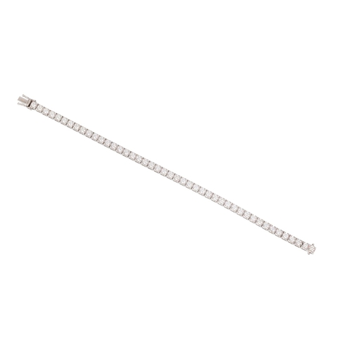 257 - A DIAMOND LINE BRACELET, the brilliant cut diamonds mounted in 18ct gold. Estimated: weight of diamo... 