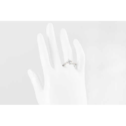 274 - A DIAMOND SOLITAIRE RING, the princess cut diamond set in a twist, mounted in 18ct white gold. Estim... 