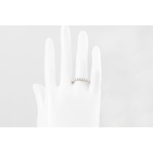 315 - A DIAMOND HALF ETERNITY RING, the brilliant cut diamonds mounted in 18ct white gold. Estimated: weig... 