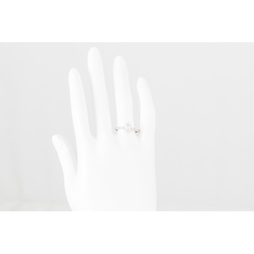 356 - A DIAMOND SOLITAIRE RING, the marquise cut diamond to diamond set shoulders, mounted in 18ct white g... 