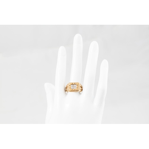 57 - A 10CT GOLD GENT'S DRESS RING, size R, 8.9 gm.