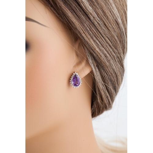 85 - A PAIR OF AMETHYST AND DIAMOND CLUSTER EARRINGS, pear shaped, mounted in white gold