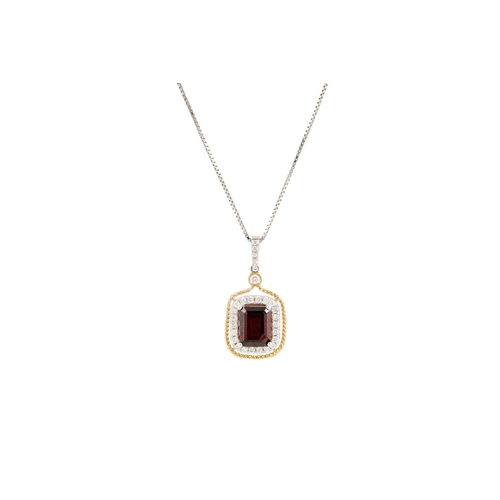 134 - A GARNET AND DIAMOND CLUSTER PENDANT, the rectangular garnet to diamond surround and bail, mounted i... 