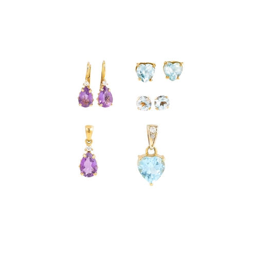 137 - A PAIR OF AMETHYST EARRINGS, together with two pairs of topaz earrings and two pendants, all mounted... 