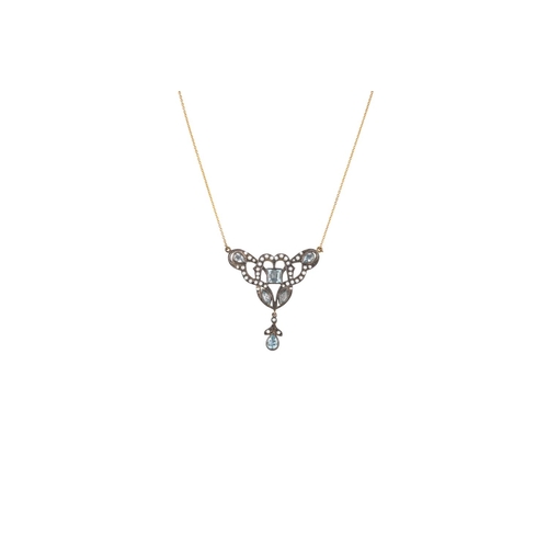 189 - AN AQUAMARINE AND SEED PEARL NECKLACE, mounted in 9ct gold in the Art Nouveau style