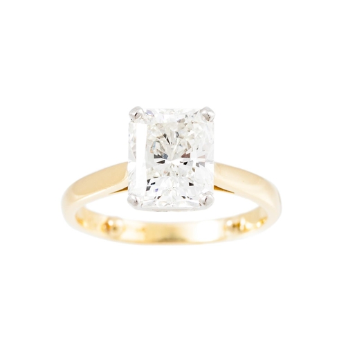 212 - A DIAMOND SOLITAIRE RING, the radiant cut diamond mounted in platinum and 18ct yellow gold. Together... 