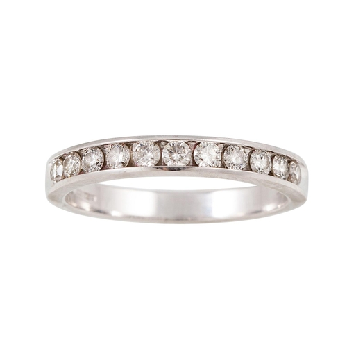 214 - A DIAMOND HALF ETERNITY RING, the brilliant cut diamonds channel set in 14ct white gold. Estimated: ... 