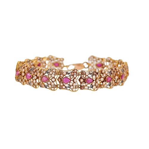 264 - A RUBY AND ROSE CUT DIAMOND BRACELET, each shaped 18ct gold link set with a pear shaped ruby and dia... 