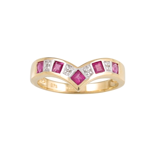 267 - A DIAMOND AND RUBY HALF ETERNITY RING, wishbone shaped, mounted in 9ct yellow gold, size N