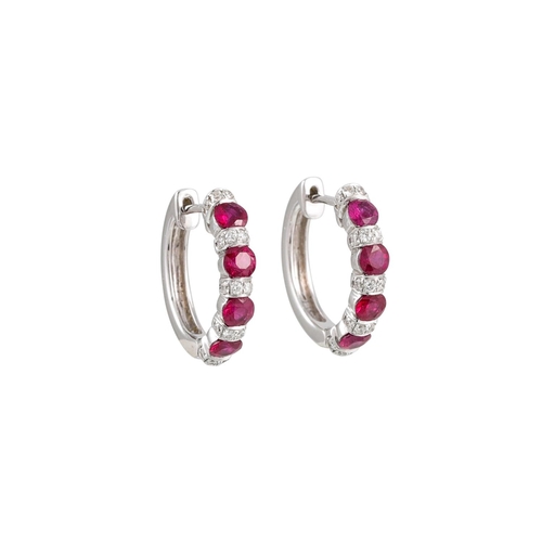 272 - A PAIR OF DIAMOND AND RUBY HOOP EARRINGS, mounted in 18ct gold. Estimated: weight of diamonds: 0.30 ... 