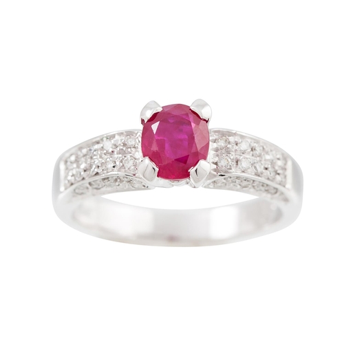 350 - A RUBY AND DIAMOND RING, the oval ruby to diamond set shoulders, mounted in 18ct gold. Estimated: we... 