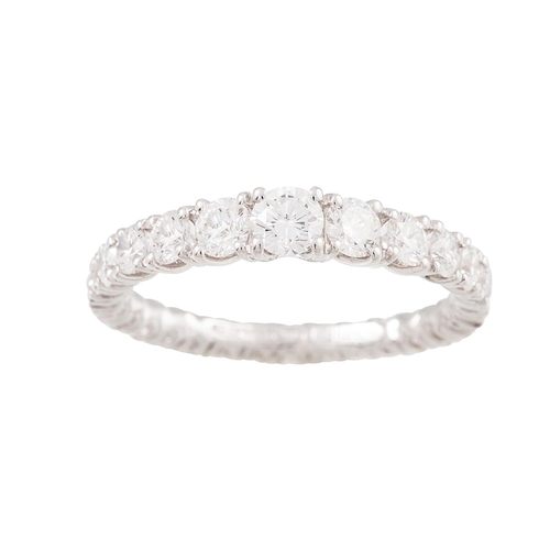 353 - A DIAMOND ETERNITY RING, the graduated brilliant cut diamonds mounted in 18ct white gold. Estimated:... 