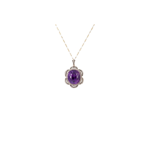 363 - AN ANTIQUE DIAMOND AND AMETHYST NECKLACE, the large cushion cut amethyst to an old cut diamond surro... 