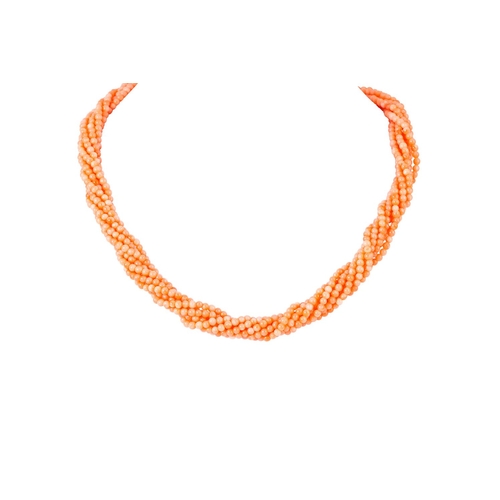 367 - A CORAL BEADED NECKLACE, comprising seven twisted strands, to an 18ct gold bow clasp