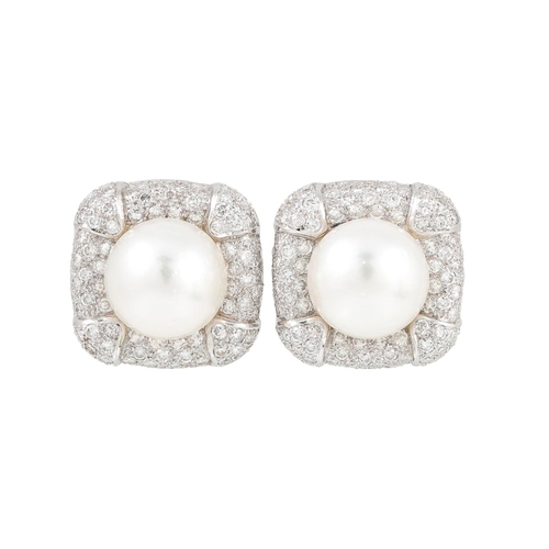 400 - A PAIR OF PEARL AND DIAMOND CLUSTER EARRINGS, the central pearls to pavé diamond surrounds, mounted ... 