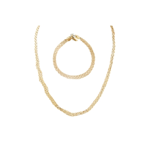 410 - A TRIPLE MESH LINK NECKLACE, mounted in 18ct yellow gold, ca 18'' long, 17.6 g., with matching brace... 