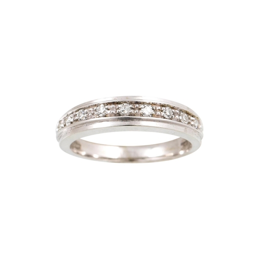 425 - A DIAMOND HALF ETERNITY RING, set with eight cut diamonds, mounted in 18ct white gold. Estimated: we... 