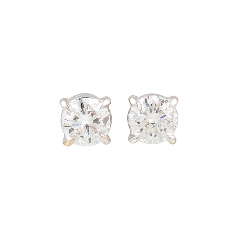 427 - A PAIR OF DIAMOND STUD EARRINGS, the brilliant cut diamonds mounted in 18ct white gold. Estimated: w... 