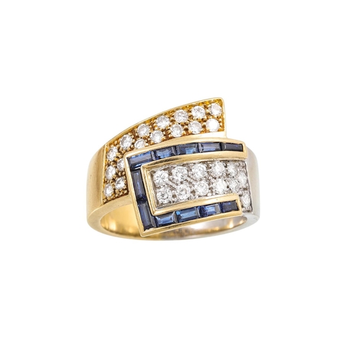 429 - A VINTAGE DIAMOND AND SAPPHIRE RING, of cross - over design, comprising two pavé diamond panels, one... 