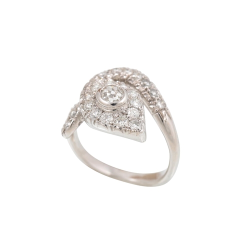 430 - A DIAMOND RING, modelled as a snake, the old cut collet set centre diamond to a pavé diamond surroun... 