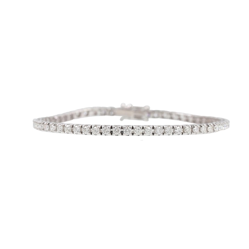 440 - A DIAMOND LINE BRACELET, the brilliant cut diamonds mounted in 18ct white gold. Estimated: weight of... 