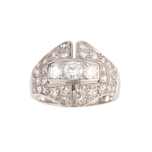 452 - A DIAMOND SET PLAQUE RING, of openwork form, the circular diamonds mounted in white gold. Estimated:... 