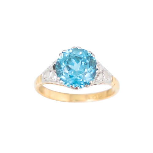 489 - A ZIRCON SET RING, mounted in 18ct yellow gold