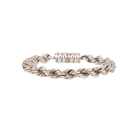 491 - A MODERN SILVER BRACELET, in an Antique Liberty & Co. box