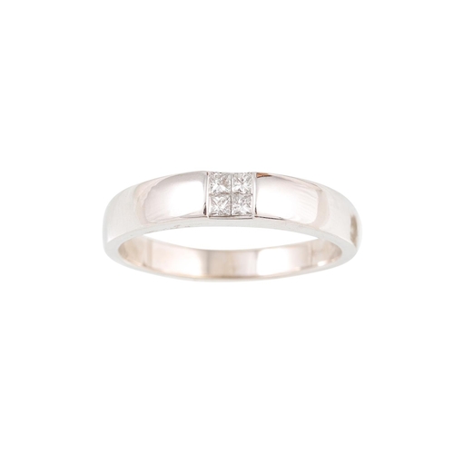 501 - A DIAMOND SET BAND RING, set with four princess cut diamonds, mounted in 18ct white gold. Estimated;... 