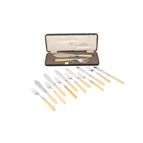 545 - A MATCHING SET OF SIX FISH KNIVES  AND FORKS, together with a pair of servers  (boxed)