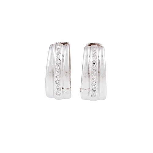 55 - A PAIR OF DIAMOND SET HOOP EARRINGS, the brilliant cut diamonds channel set in 18ct gold. Estimated:... 