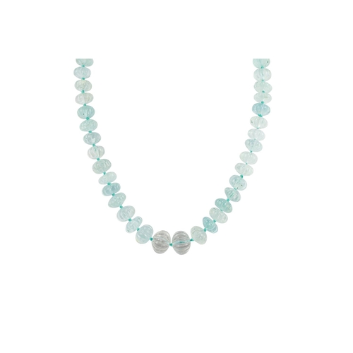 56 - AN AQUAMARINE BEADED NECKLACE, the carved beads to an 18ct gold diamond set barrel clasp