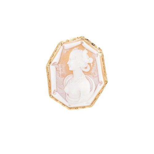 305 - A CARVED SHELL CAMEO of a young lady in a landscape, 18ct yellow gold frame. Size 45 mm x 55 mm