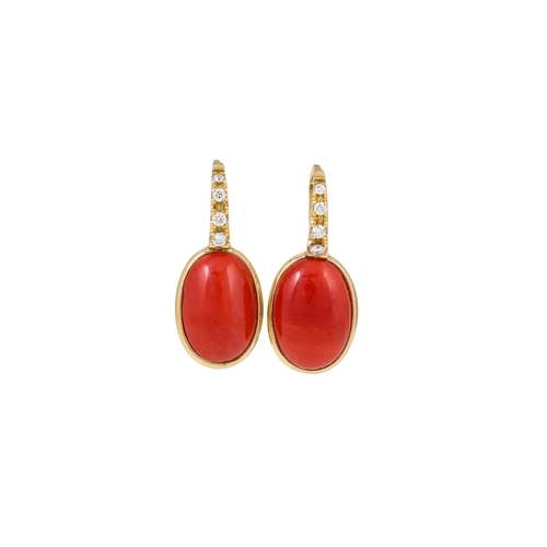 335 - A PAIR OF CORAL AND DIAMOND EARRINGS, the cabochon corals surmounted by diamond detail, mounted in 1... 