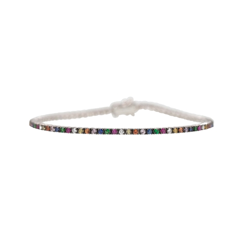 339 - A MULTI GEM SET LINE BRACELET, set with circular diamonds, ruby, coloured sapphires etc., 18ct white... 