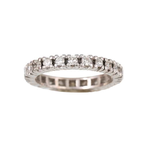 340 - A DIAMOND ETERNITY RING, the brilliant cut diamonds mounted in 18ct white gold. Estimated: weight of... 