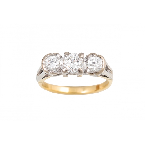 477 - A THREE STONE DIAMOND RING, mounted in 18ct gold. Size N