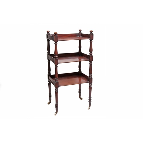 567 - A VICTORIAN MAHOGANY THREE TIERED WHATNOT, of narrow rectangular form, turned legs, terminating in f... 