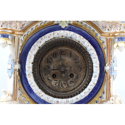 232 - A LARGE ANTIQUE GERMAN PORCELAIN CLOCK