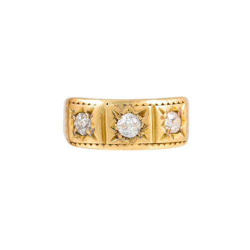 125 - A VINTAGE THREE STONE DIAMOND RING, gypsy set with old cut diamonds, mounted in 18ct gold