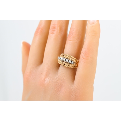 130 - A RETRO SEVEN STONE DIAMOND RING, the eight cut diamonds to rope edge decoration, mounted in 10ct go... 